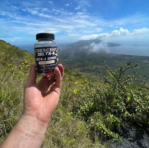 Delta-8 Rocket Gummies in front of a mountain