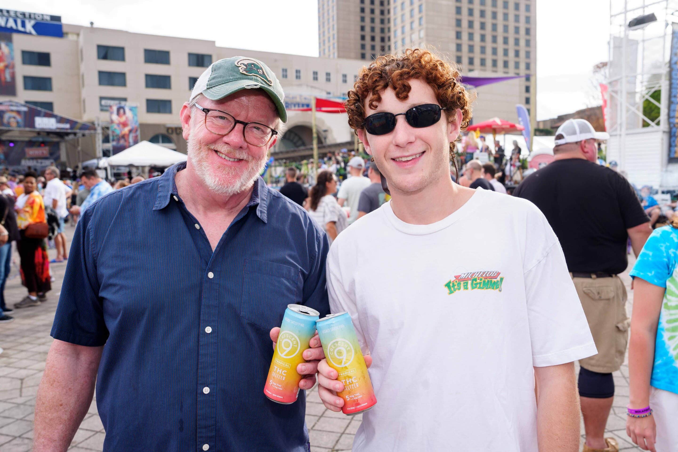 An older man and his son enjoying THC drinks