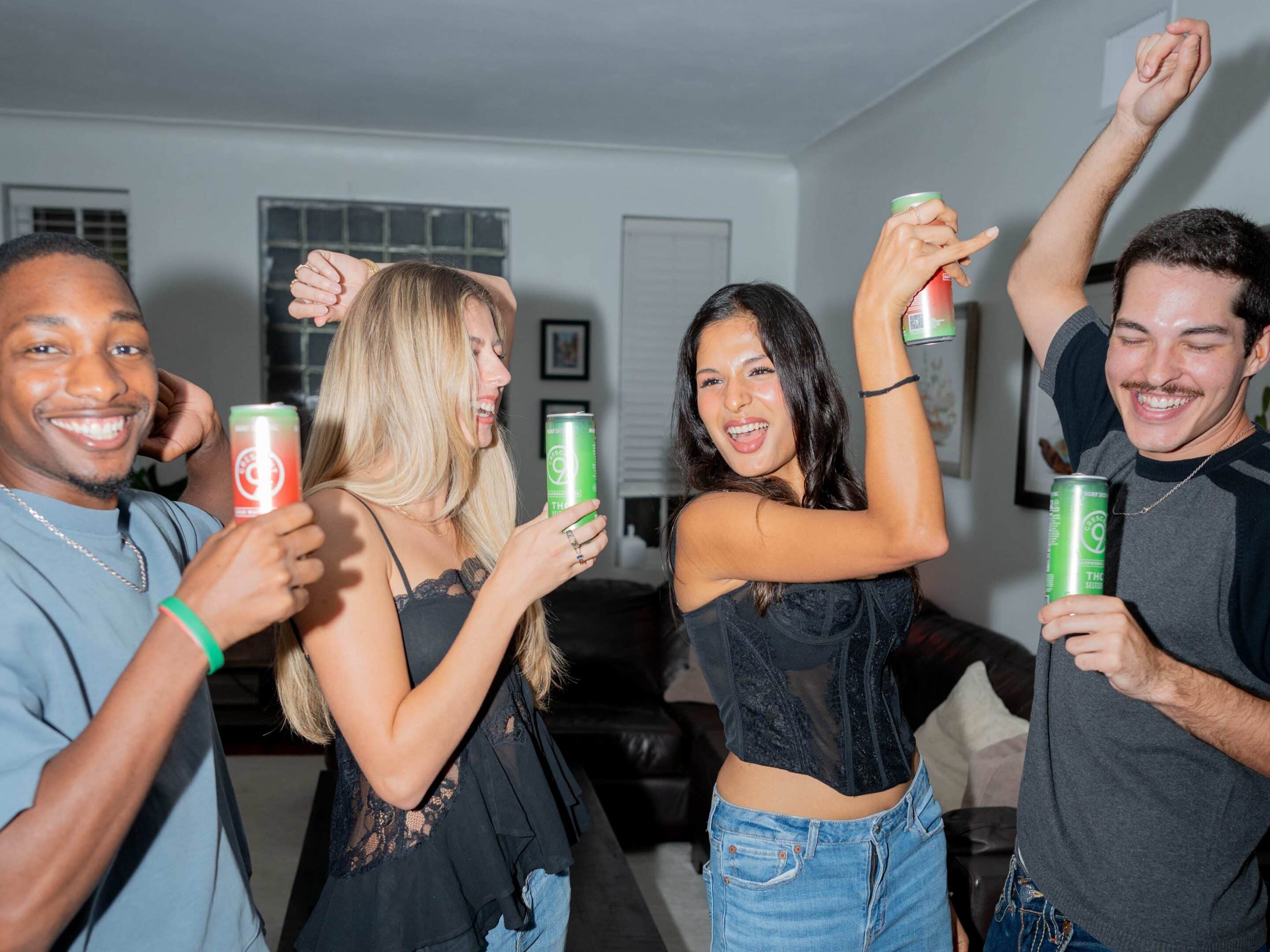 Friends at a party with THC drinks