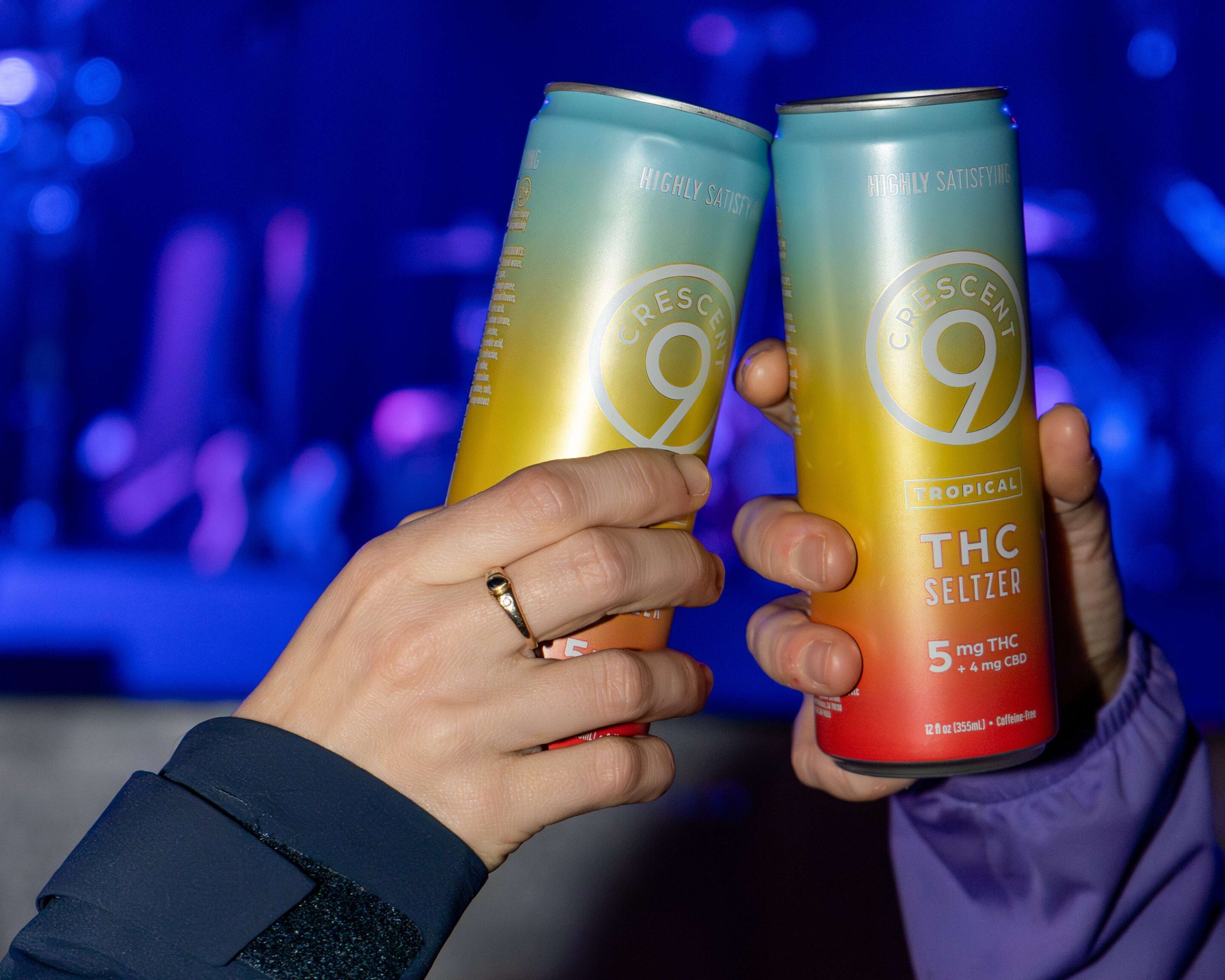 Two nano THC drinks being clinked